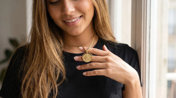 How to Layer Everyday Necklaces With Ease: golden sun necklace worn, personalized jewelry in 304L stainless steel