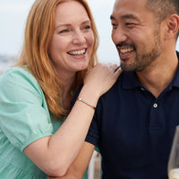Thumbnail for Couple moment, she wears the 2020 Survivor bracelet in rose gold | SKU: 2020s-rg