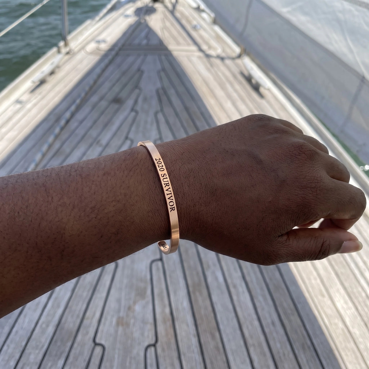 2020 Survivor bracelet in rose gold worn, showing its real size | SKU: 2020s-rg