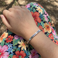 Thumbnail for 2020 Survivor bracelet in silver worn, showing its real size | SKU: 2020s-wg