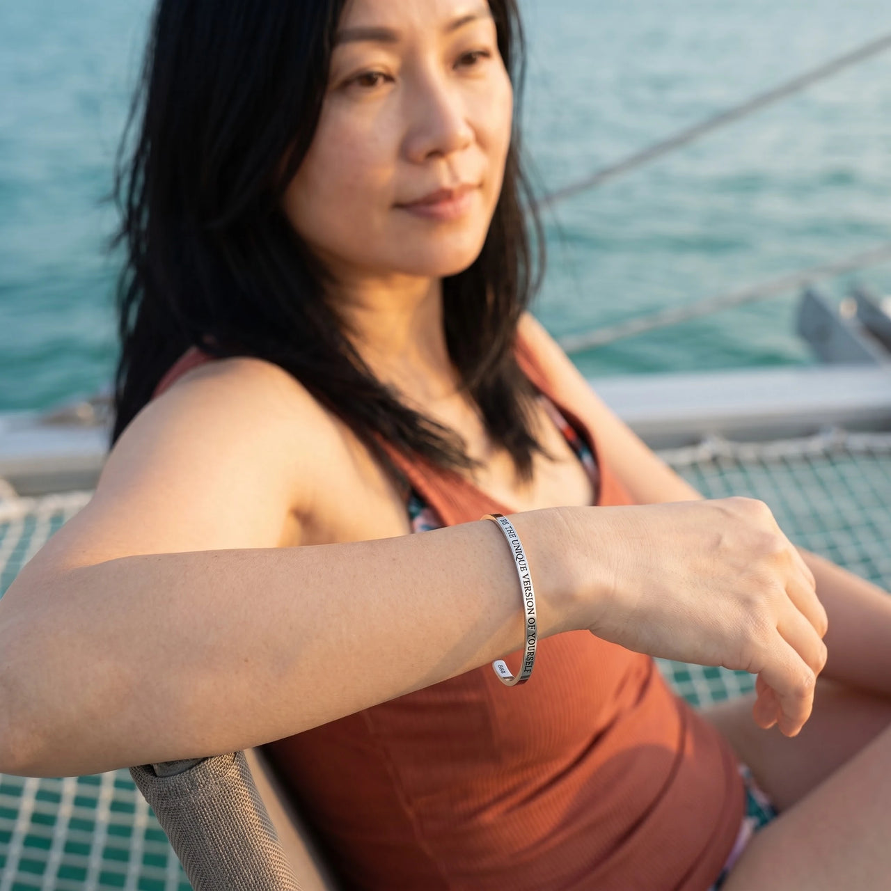 Be The Unique Version Of Yourself bracelet in silver worn during a relaxed moment | SKU: btuvoy-wg