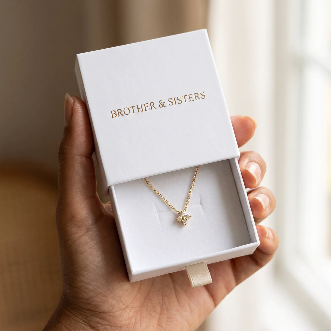 Crystal Flower Necklace by Brother & Sisters in gold gift box