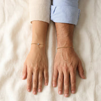 Thumbnail for Heart Bond Matching Bracelet Set in Gold — worn by a couple, wrists side by side