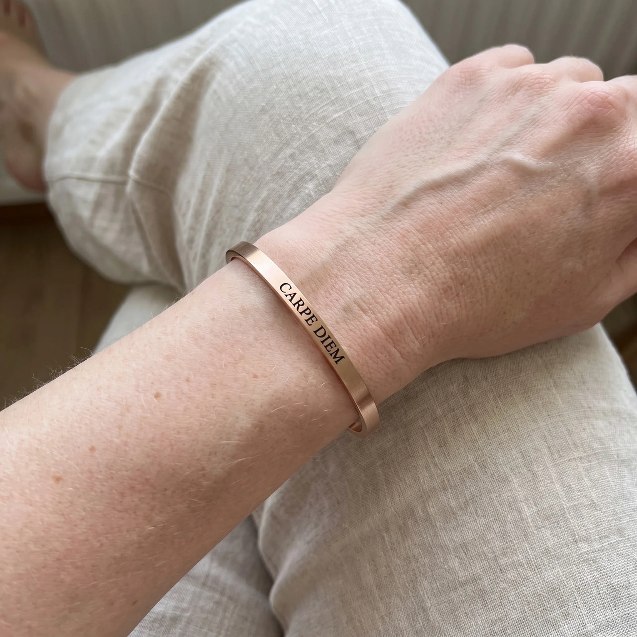 Carpe Diem bracelet in rose gold worn, showing its real size | SKU: cp-rg
