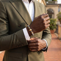 Thumbnail for Gold Lion & Grey Stones Bracelet – worn with a shirt cuff | Brother & Sisters | SKU: 20866222-gold-XS-14-15, 20866222-gold-S-16-17, 20866222-gold-M-18-19, 20866222-gold-L-20-21, 20866222-gold-XL-22-23