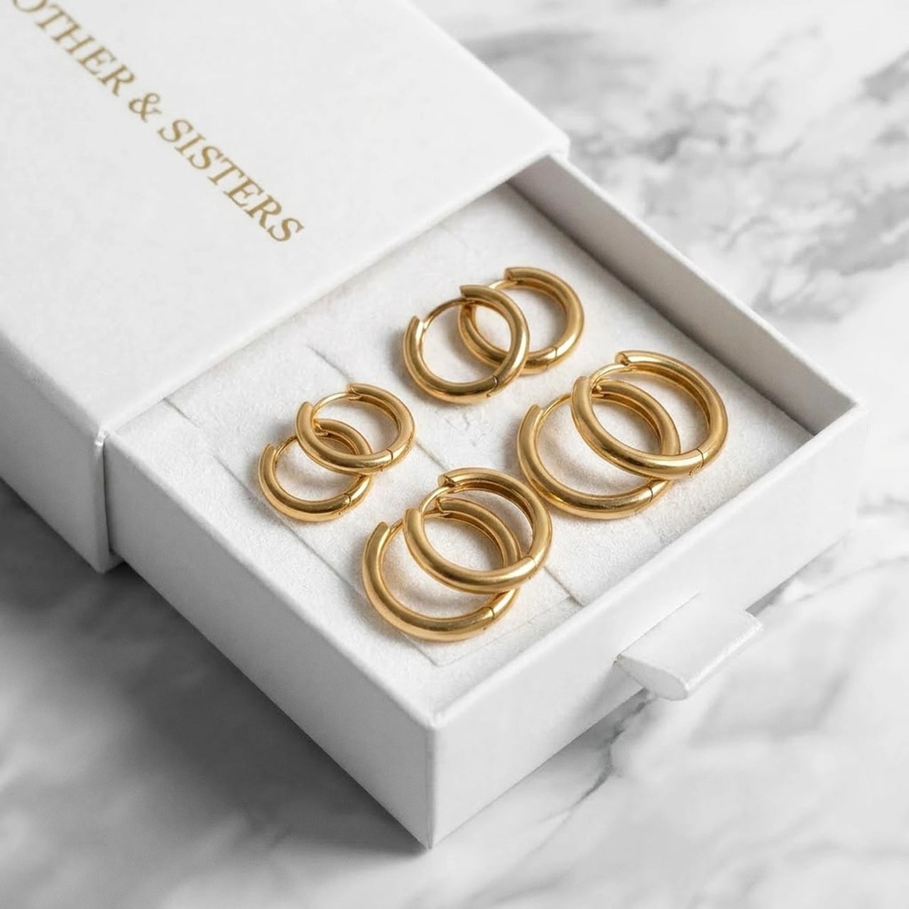 Huggie Hoop Earrings Set of 4 Pairs in Gold in the Brother & Sisters gift box | SKU: huggie-set-gold