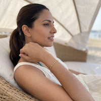 Thumbnail for The Finesse bracelet in gold worn during a relaxed moment | SKU: lafinesse