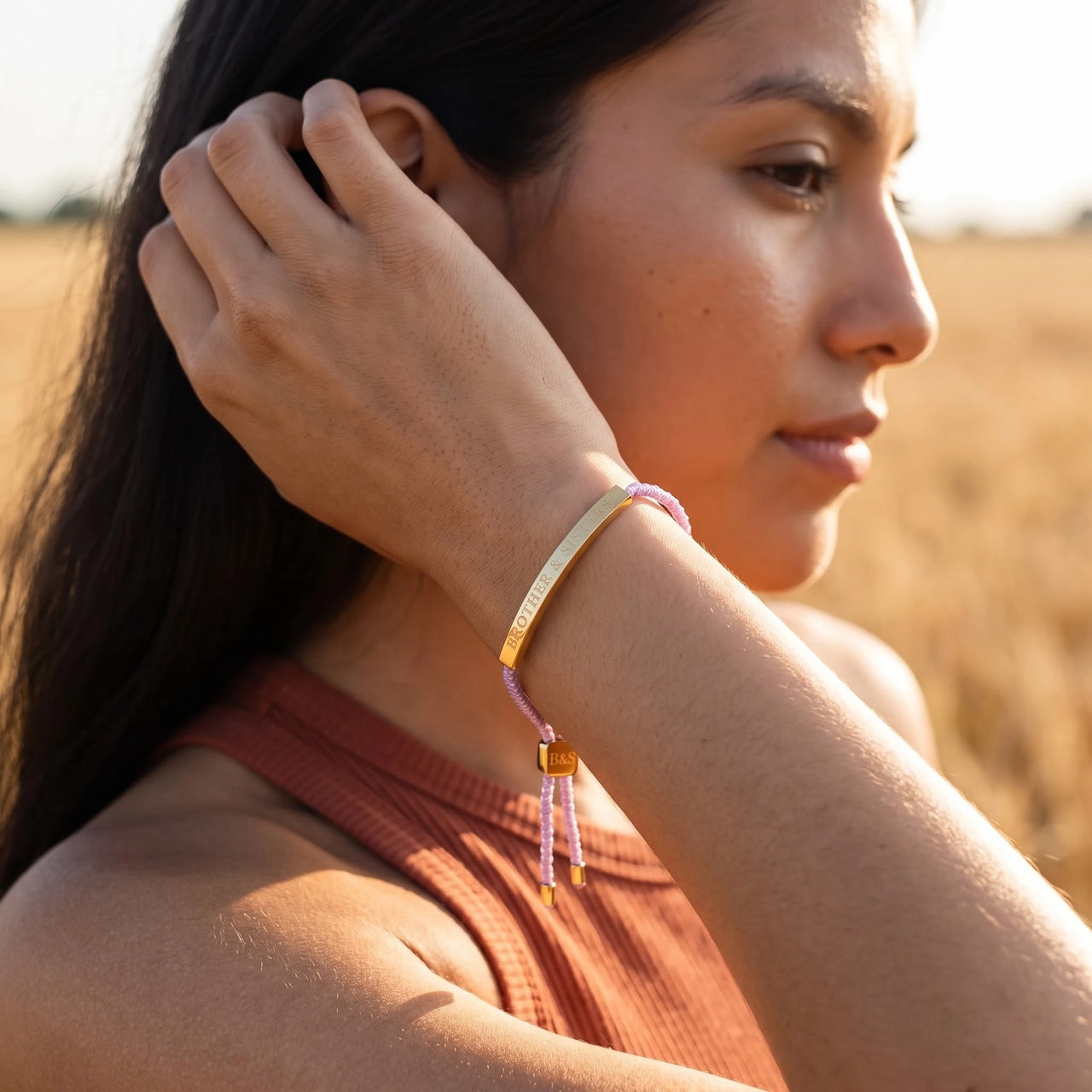 Le Mauve, gold bracelet — worn gesture | SKU: lemauve-g