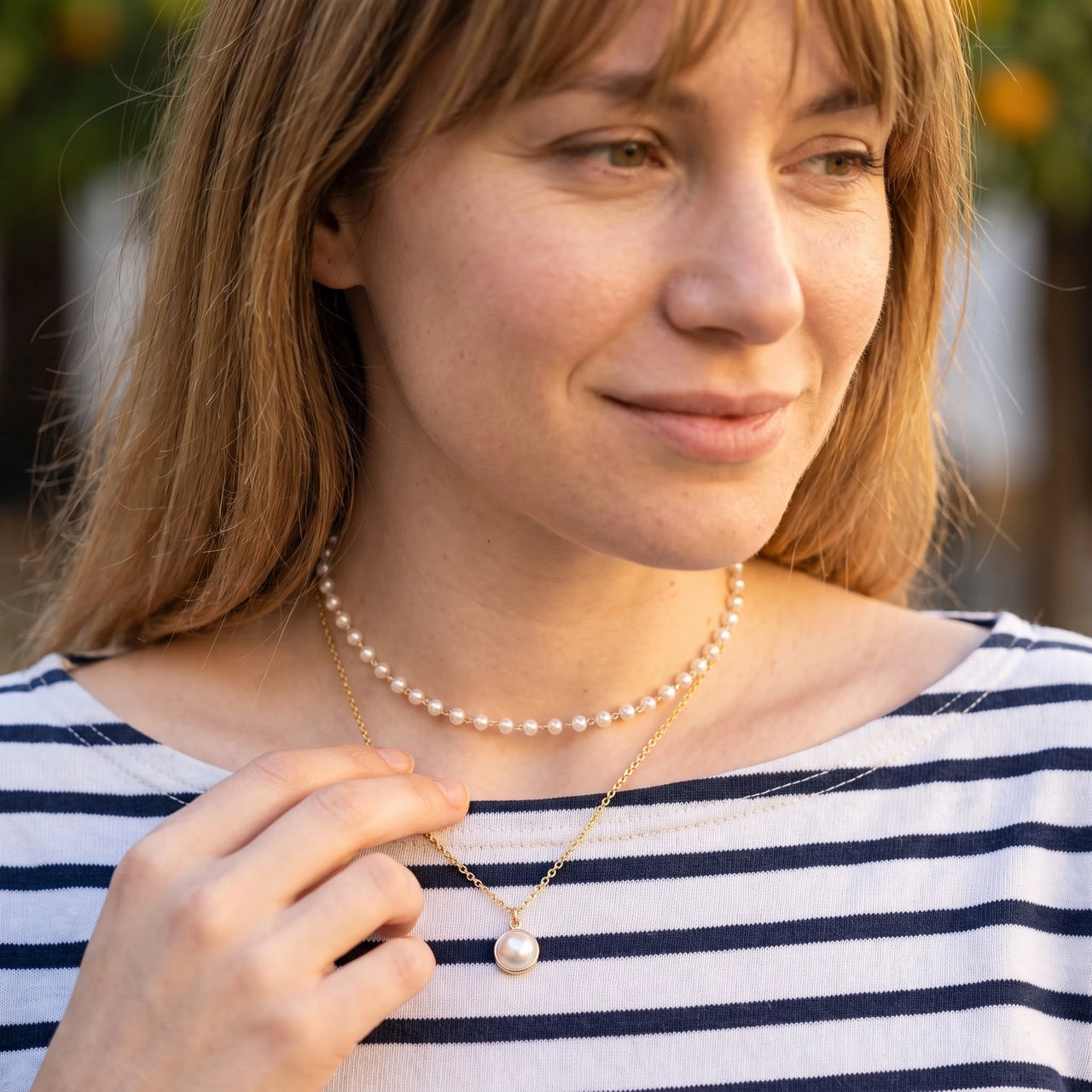 The Pure, gold necklace — worn gesture | SKU: lepure