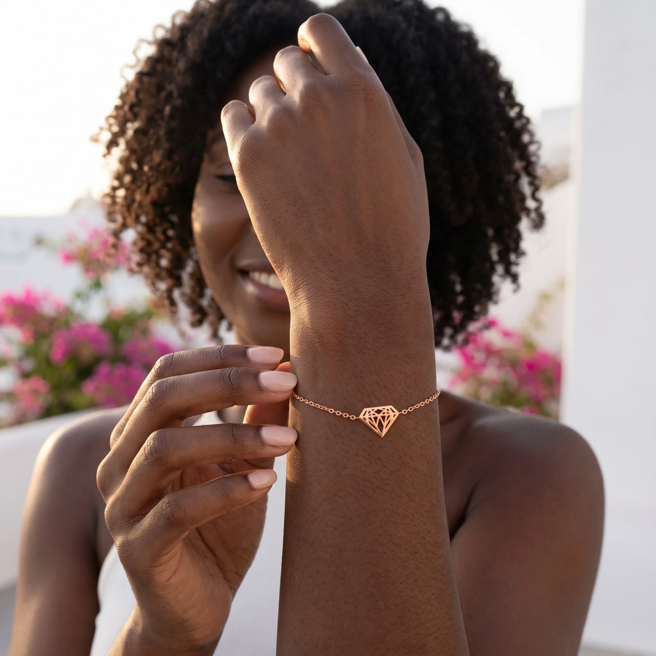 Woman gently touching her rose gold bracelet | SKU: 11662607-rose-gold