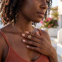 Thumbnail for Woman gently touching her gold necklace | SKU: 22173453-gold