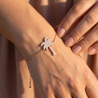 Thumbnail for Close-up of the rose gold charm bracelet worn on the skin | SKU: 7819407-rose-gold-color