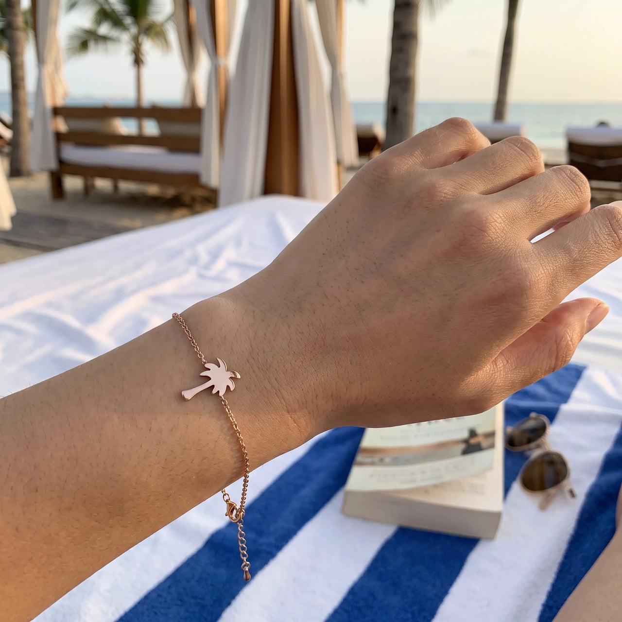 Rose gold charm bracelet worn, showing its real size | SKU: 7819407-rose-gold-color