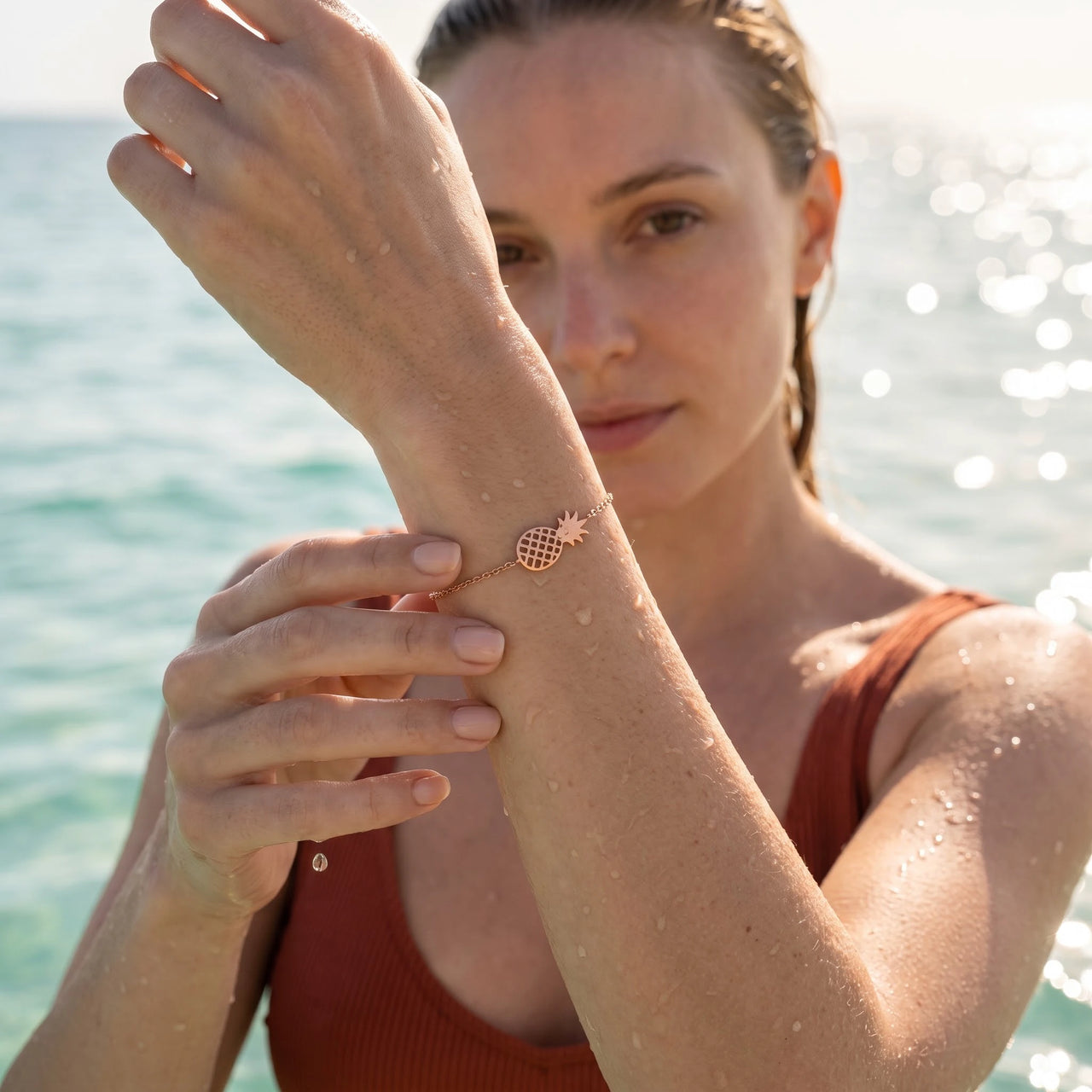 Pineapple charm bracelet — worn in the water, waterproof, rose gold | SKU: 9178613-rose-gold
