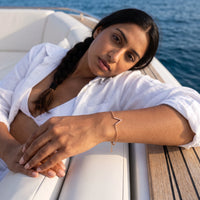 Thumbnail for Woman on a yacht wearing the rose gold bracelet | SKU: 9443177-rose-gold