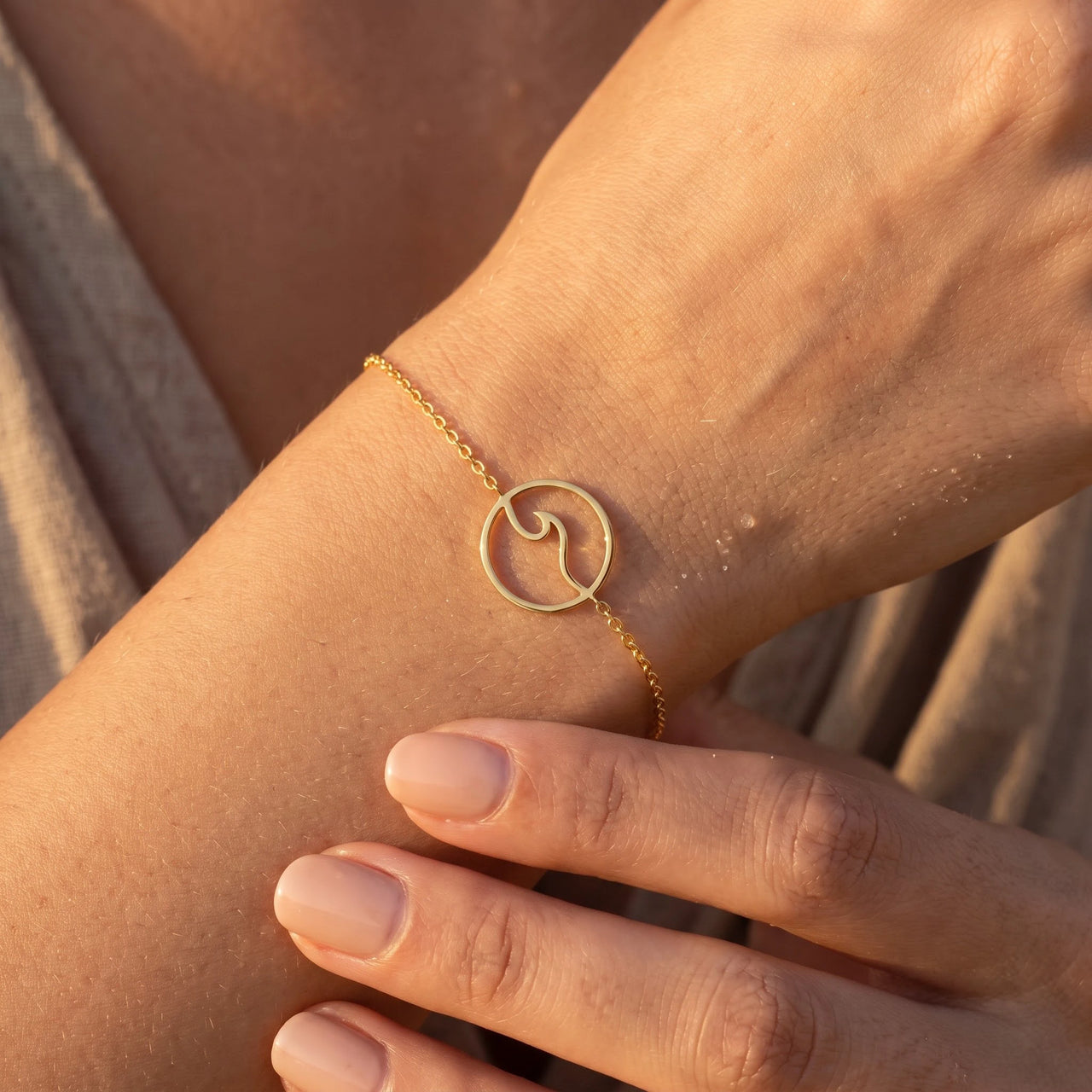 Close-up of the gold bracelet worn on the skin | SKU: 17429078-gold
