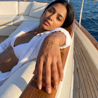 Thumbnail for Woman on a yacht wearing the gold bracelet | SKU: 17429078-gold