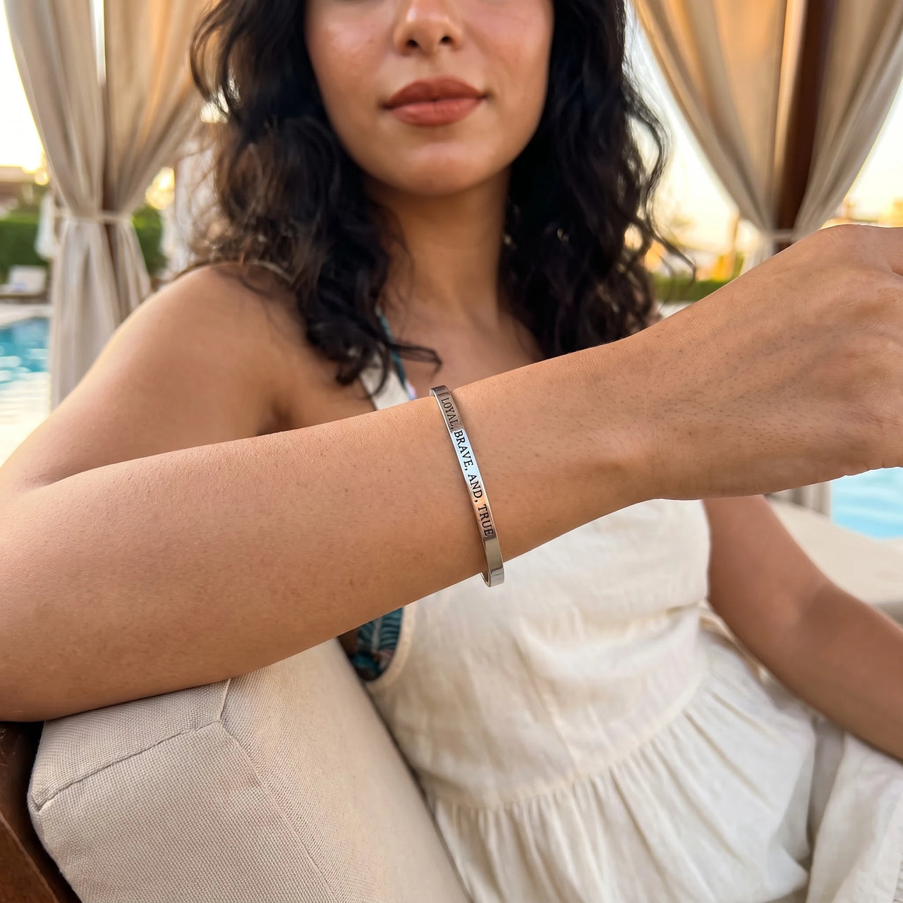 Loyal, Brave, And, True bracelet in silver worn during a relaxed moment | SKU: lbat-wg