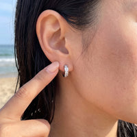 Thumbnail for Silver huggie hoop earrings worn, showing its real size | SKU: 22023999-rhodium