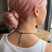 Thumbnail for Back of the neck showing the lobster clasp and extension chain of the black heart photo necklace | SKU: TPH-CHTN-BLACK-SMALL