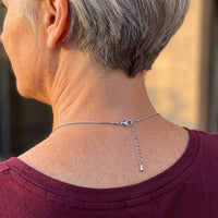 Thumbnail for Back of the neck showing the lobster clasp and extension chain of the silver heart photo necklace | SKU: TPH-CHTN-SILVER-SMALL