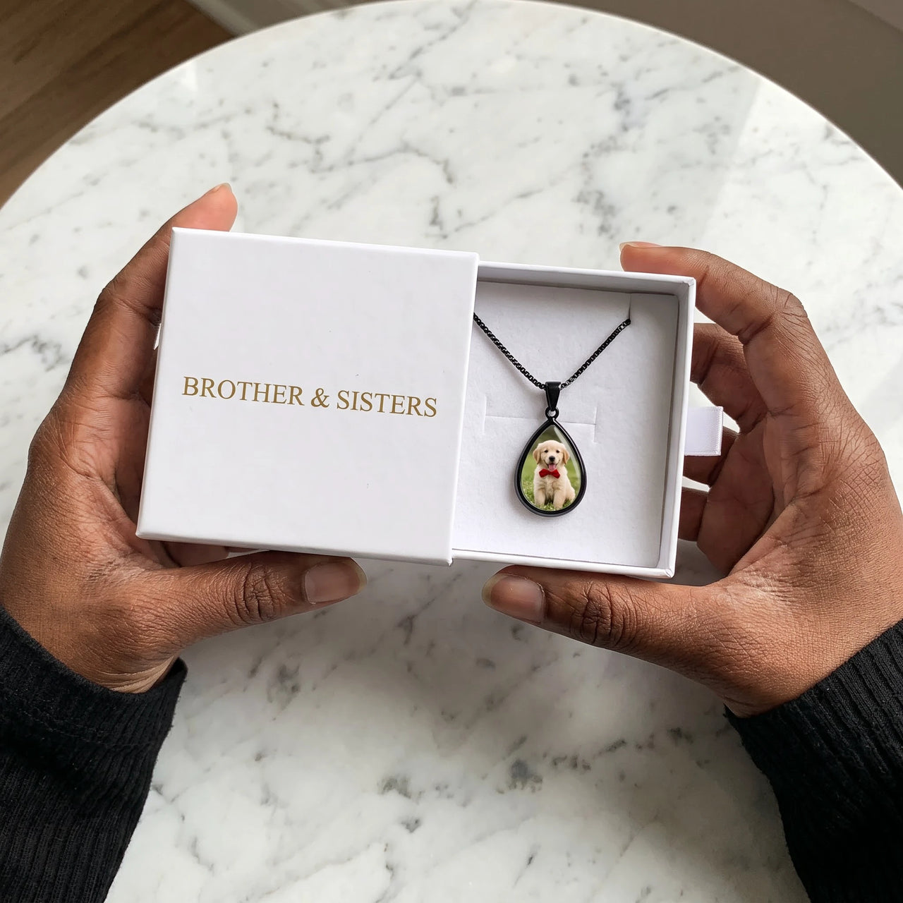 The black drop photo necklace with a puppy photo in the Brother & Sisters gift box | SKU: TPH-DRPN-BLACK