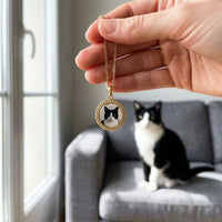 Thumbnail for Customer photo: the gold round necklace with her cat's photo, her cat in the background | SKU: TPH-RNDN-GOLD