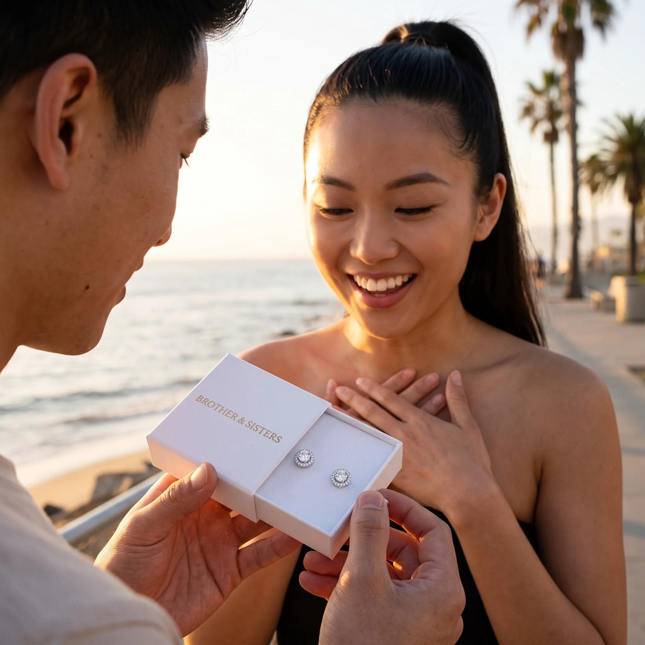 He surprises her with the silver ring in its gift box | SKU: 19991927