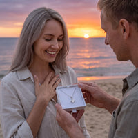 Thumbnail for He surprises her with the silver necklace in its gift box | SKU: 6309048