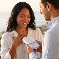 Thumbnail for He surprises her with the silver necklace in its gift box | SKU: 505744