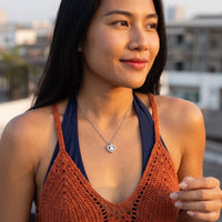 Thumbnail for Woman relaxing on holiday wearing the silver necklace | SKU: 505744