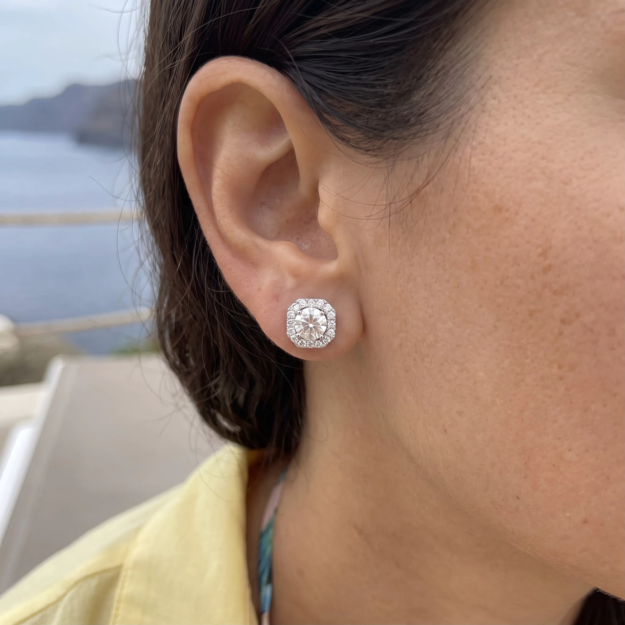 Woman relaxing on holiday wearing the silver stud earrings | SKU: 505263