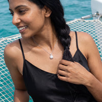 Thumbnail for Woman relaxing on holiday wearing the silver necklace | SKU: 505762