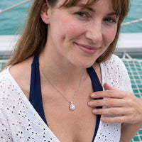 Thumbnail for Woman relaxing on holiday wearing the silver necklace | SKU: 505762