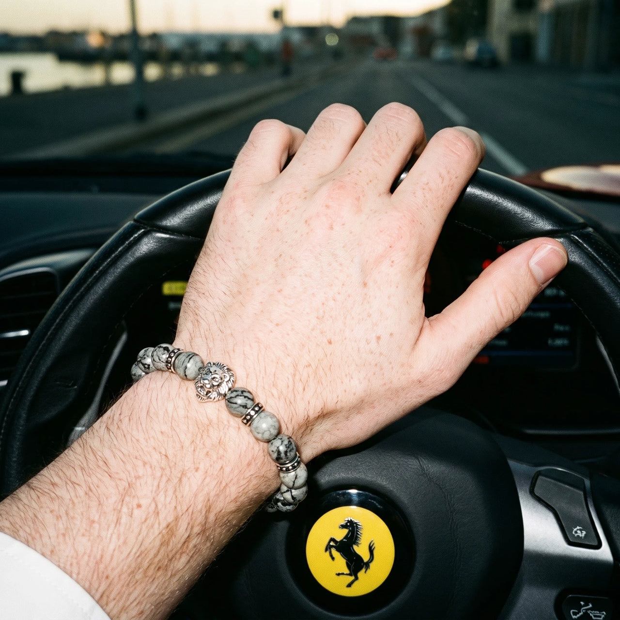 White Gold Lion & Grey Stones Bracelet – worn at the steering wheel of a luxury car | Brother & Sisters | SKU: 20866222-silver-XS-14-15, 20866222-silver-S-16-17, 20866222-silver-M-18-19, 20866222-silver-L-20-21, 20866222-silver-XL-22-23